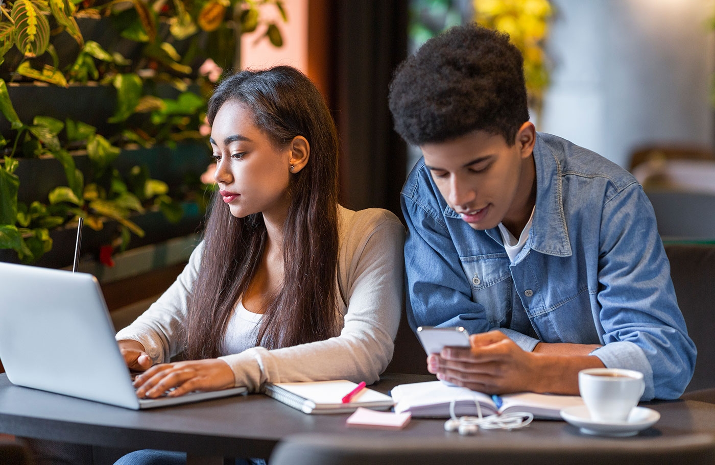 couple-of-students-using-technologies-in-studying-RB4L298-min.jpg